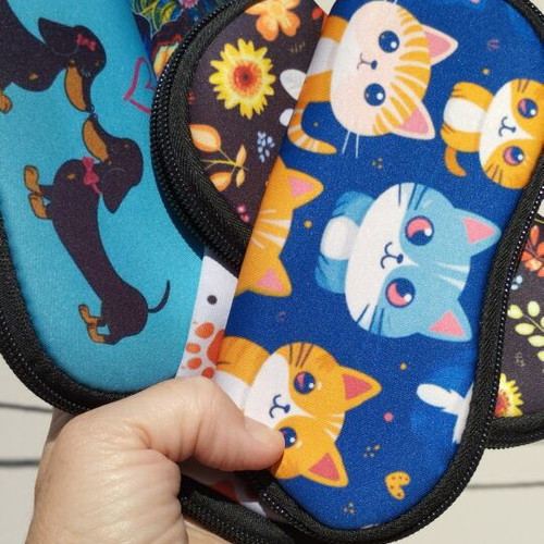 Waterproof glasses case with colorful cat, dog, butterfly, and flower designs