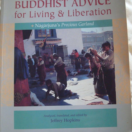 Buddhist Advice for Living & Liberation used with yellowed pages