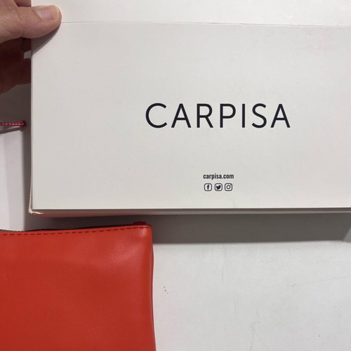 Carpisa orange handbag new with wristlet