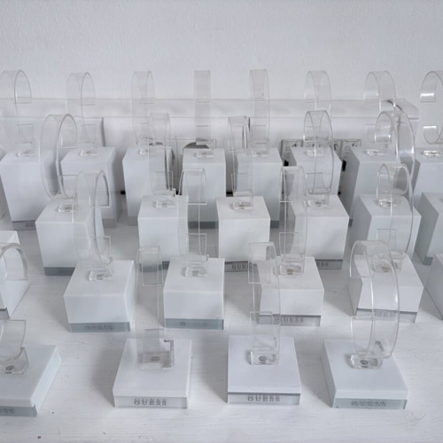 Guess 26 bases for bracelets or watches, like new, display stands set