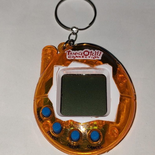 Tamagotchi Connection Orange Transparent like new