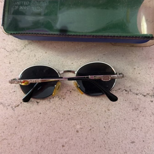 Children's sunglasses used, silver color