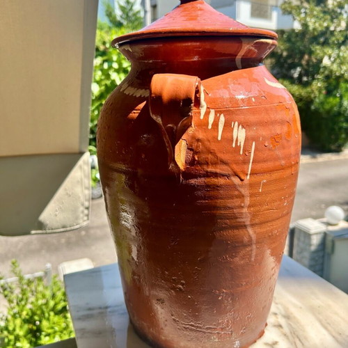 Old traditional ceramic jar used, handmade with lid