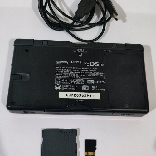 Nintendo DS Lite console with Pokemon LeafGreen cartridge used