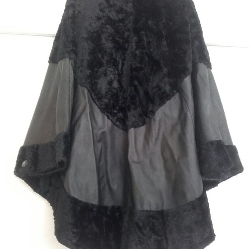 Italian cape new from genuine leather and fur size medium