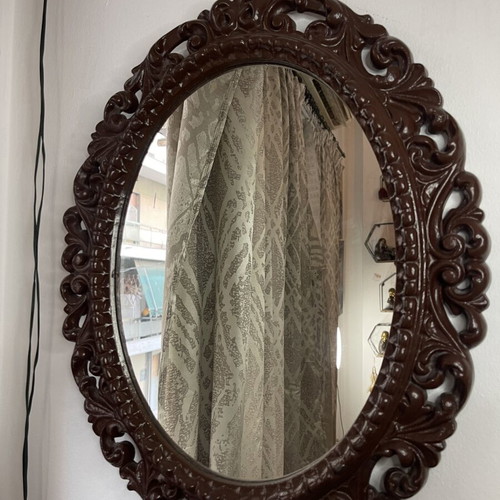 Vintage oval wall mirror with embossed frame