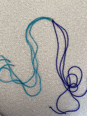 Multifunctional necklace with blue beads like new