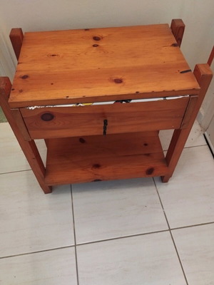 Wooden nightstand used with drawer