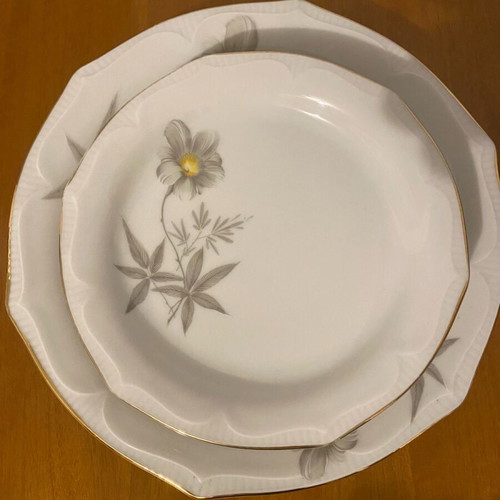 Set of 4 small plates and 1 large vintage plate used with gold detail