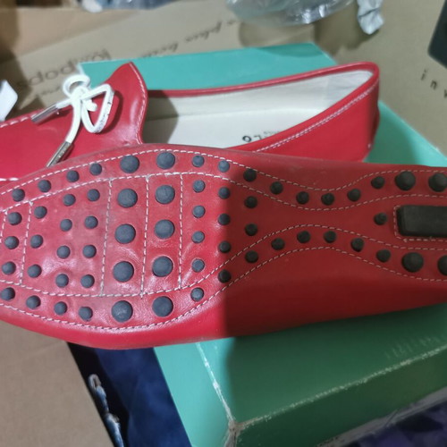 Red women's driving shoes with white decoration