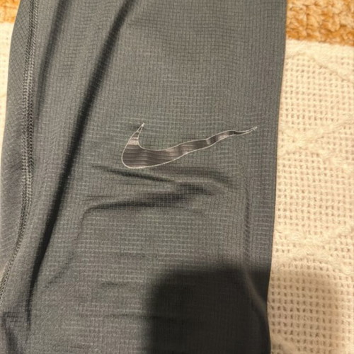 Nike leggings men's-women's size M like new, black and gray