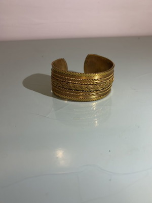 Wide bracelet like new, gold-colored