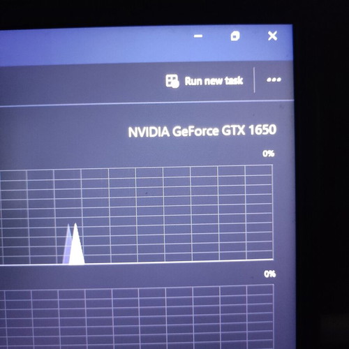 ASUS ROG Strix G531GT gaming laptop with headphones and keyboard