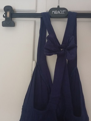 Paranoia mini dress blue with crisscross back and bow size S like new