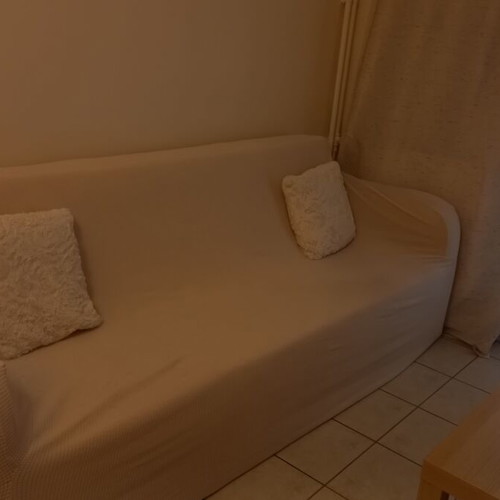 4-seat sofa bed with cover and two cushions