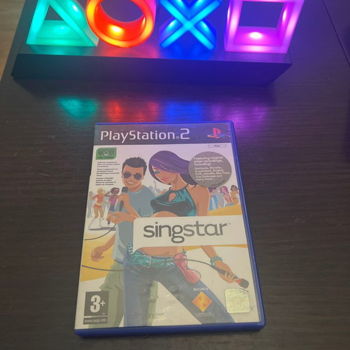 SingStar PS2 game used with manual