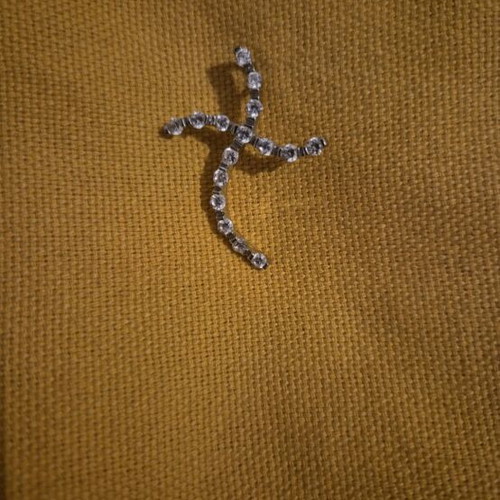 Silver cross with stones like new