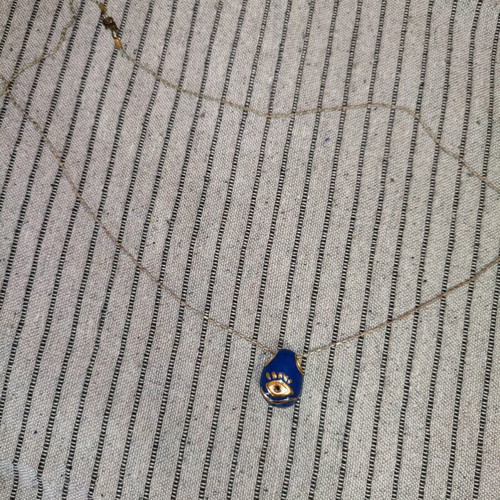 Necklace with eye charm used