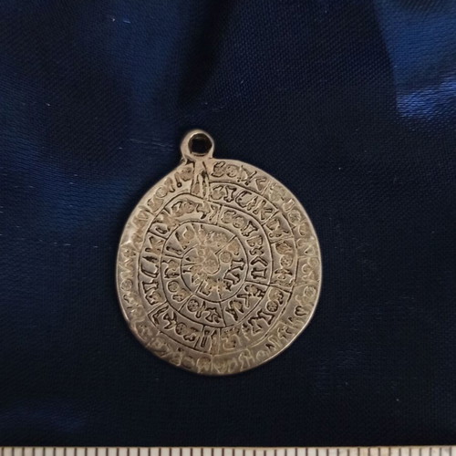 Silver pendant Phaistos disc used