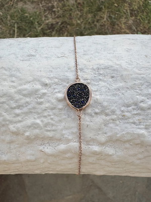 Oxette bracelet new, rose gold with black and blue crystals