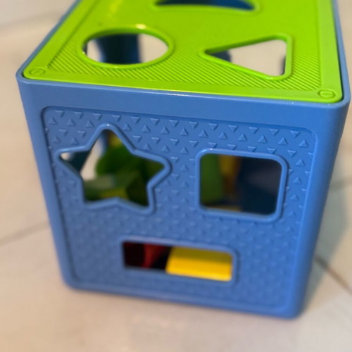 Shape sorting cube like new with blue and green colors