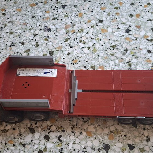Scania truck with Cat bulldozer toy