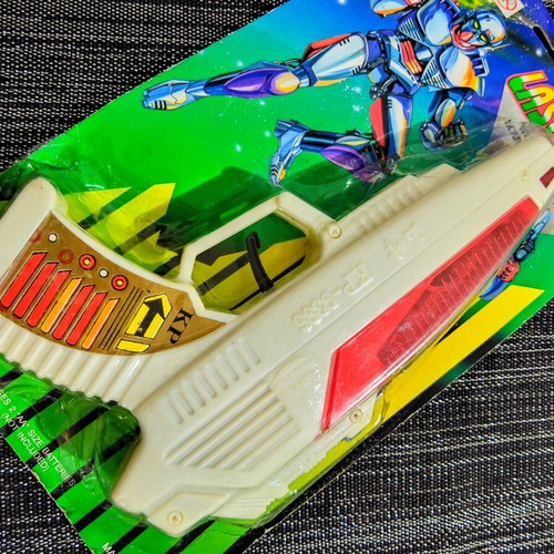 Vintage Space Laser Gun new, sealed in blister pack