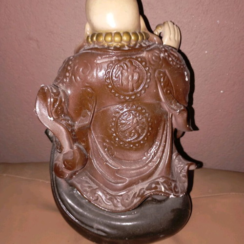 Budai statue used, symbol of happiness and prosperity