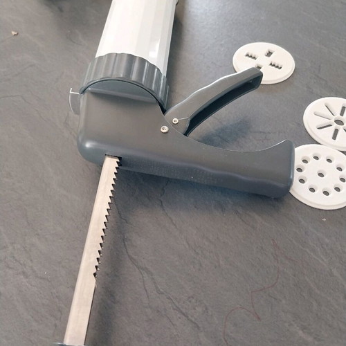 Cookie press used with 5 design discs