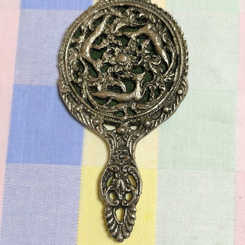 Vintage hand mirror used