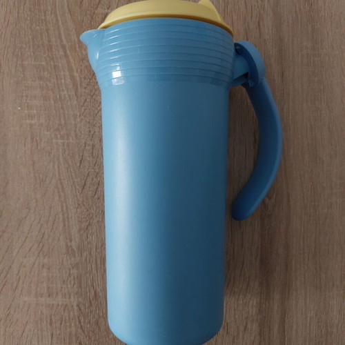 Tupperware jug 1.1lit used with removable handle and screw cap