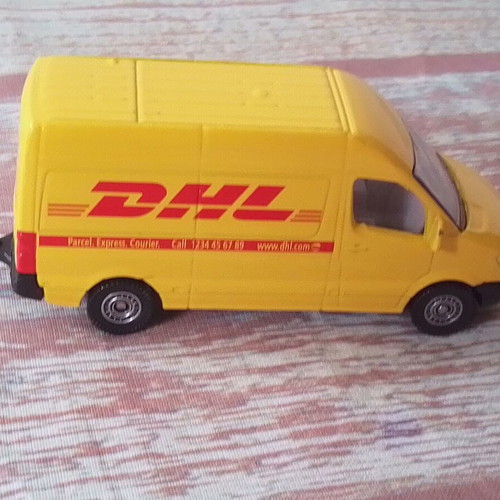 Metal DHL Mercedes Sprinter Van toy car used (siku)