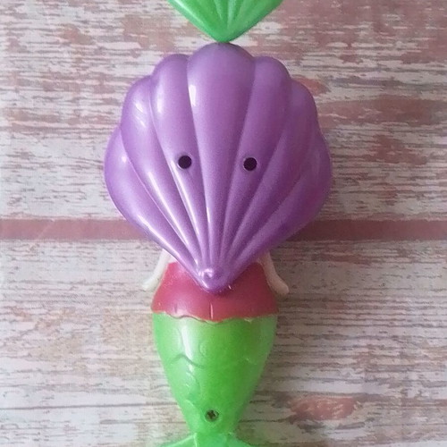 Bath mermaid toy used, wind-up swimming figure with tail movement