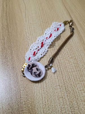 Martis bracelet like new, handmade with red and white thread