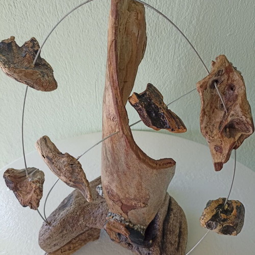 Handmade table decor with driftwood and metal design