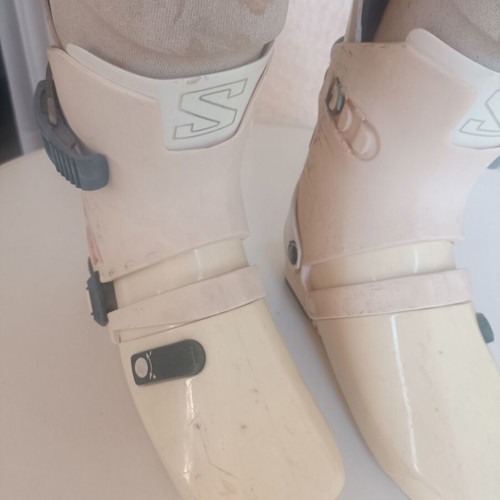 Rossignol STS Fibroplastic skis used with Tyrolia 260 bindings, Skitique poles, and Solomon SX81 325 boots