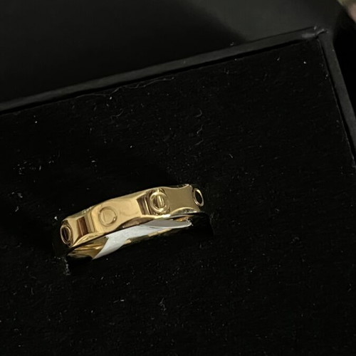 Ring new, gold-tone stainless steel with modern design