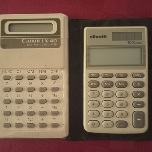 Olivetti and Canon pocket calculators used, 80s vintage, set of 2