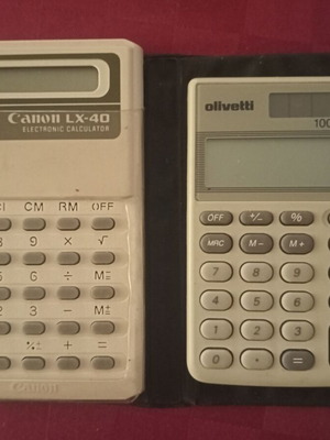 Olivetti and Canon pocket calculators used, 80s vintage, set of 2