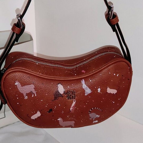 Kem crossbody bag brown new with animal designs and zipper