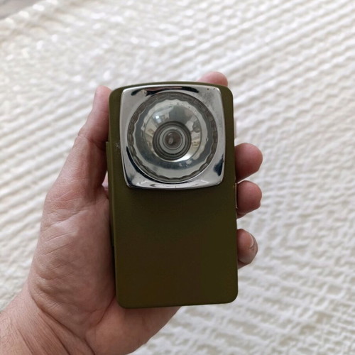 Tin flashlight from the 70s vintage used