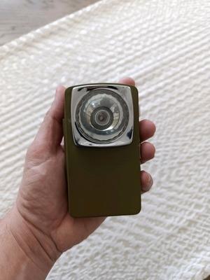 Tin flashlight from the 70s vintage used