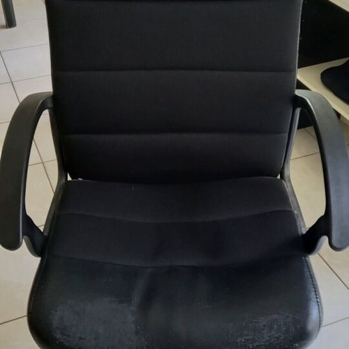 Black office chair with leatherette seat and backrest