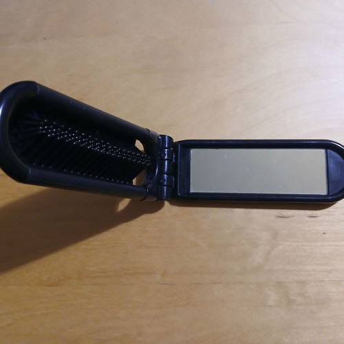 Travel mirror and comb like new