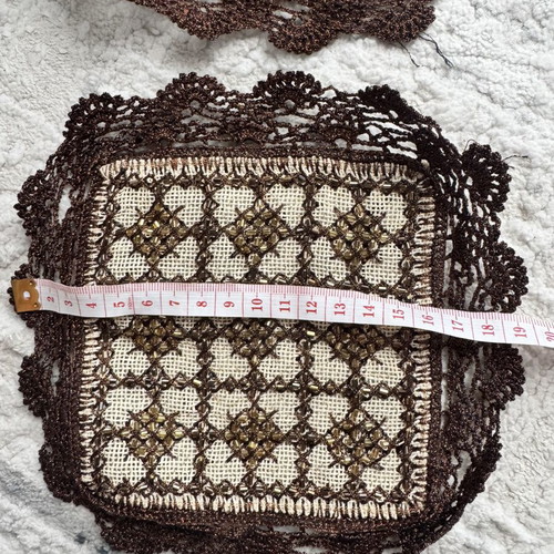 Vintage coasters used with lace and decorative beads in brown-bronze