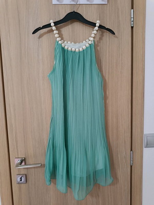 Dress like new with pearl neckline, mini length and lining, size S