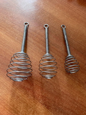 Set of manual honey whisks used
