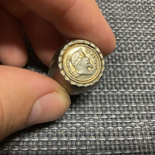 Men's metal ring used with signs of wear