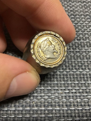 Men's metal ring used with signs of wear
