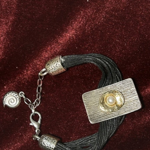 Handmade bracelet by Kostibas like new, black and gold